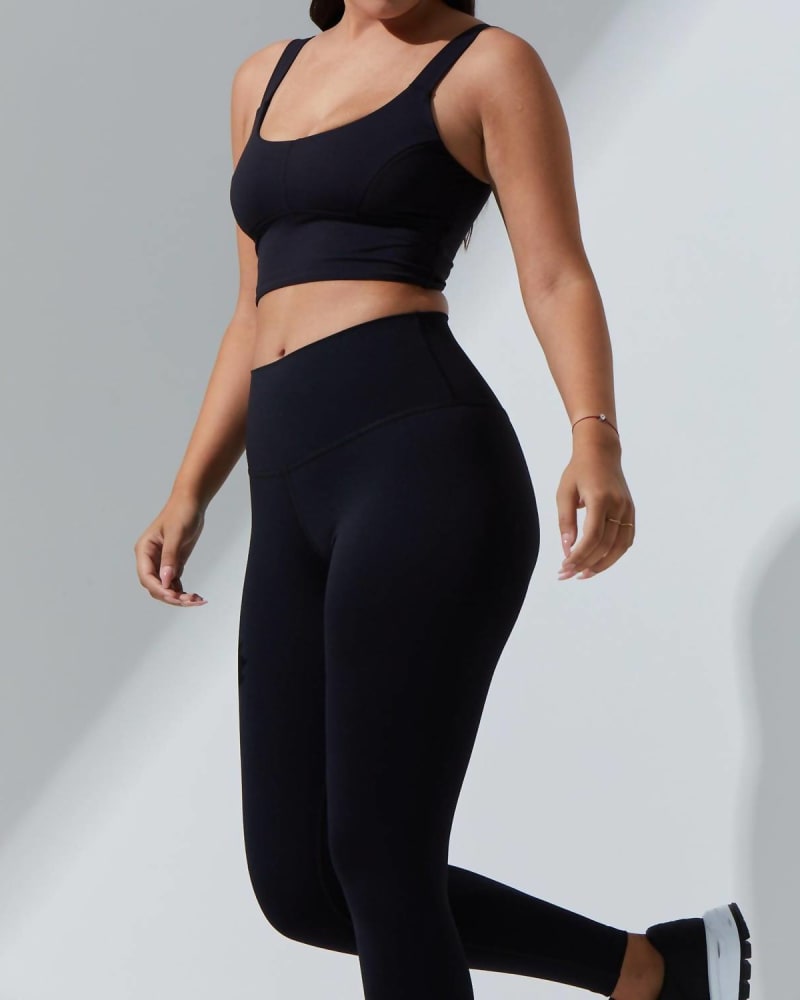 Front of a model wearing a size Large Bliss Bra in Black in Black by NOLI. | dia_product_style_image_id:339376